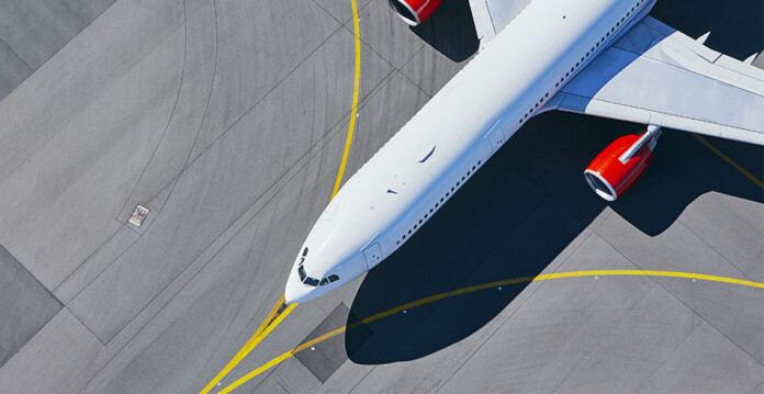 Aeroplane parked on tarmac (newcastle flow)