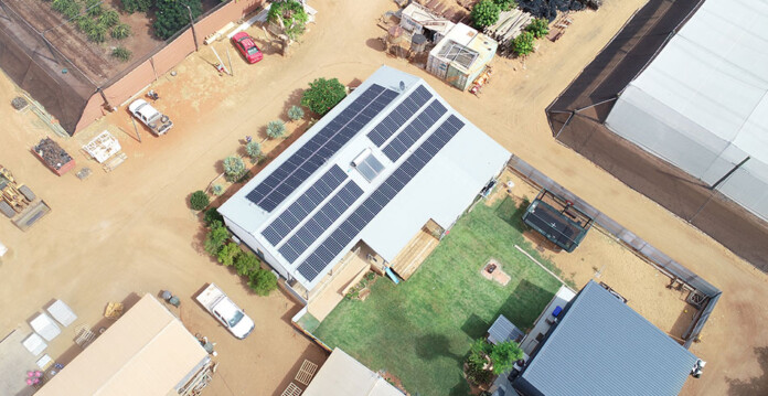 Aerial shot of regional home with solar panels on the roof (smart connect solar)